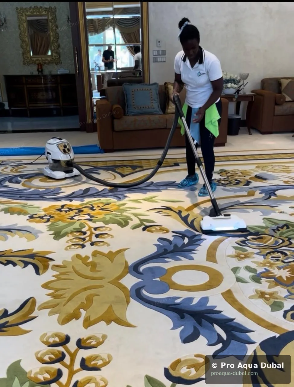 Pro Aqua carpet deep cleaning in progress — Dubai 2025