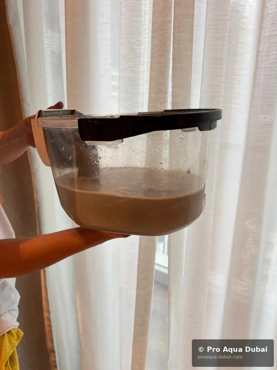 Dirty water result after deep cleaning of a mattress — Pro Aqua Dubai