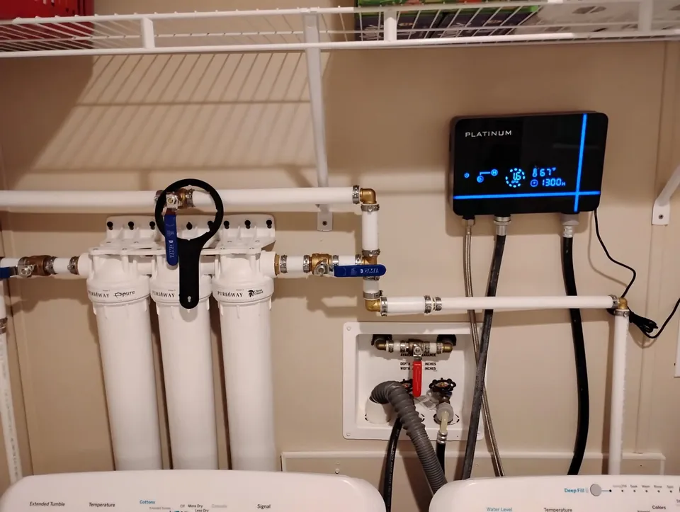 Real partner reference image of a whole-house water filtration installation